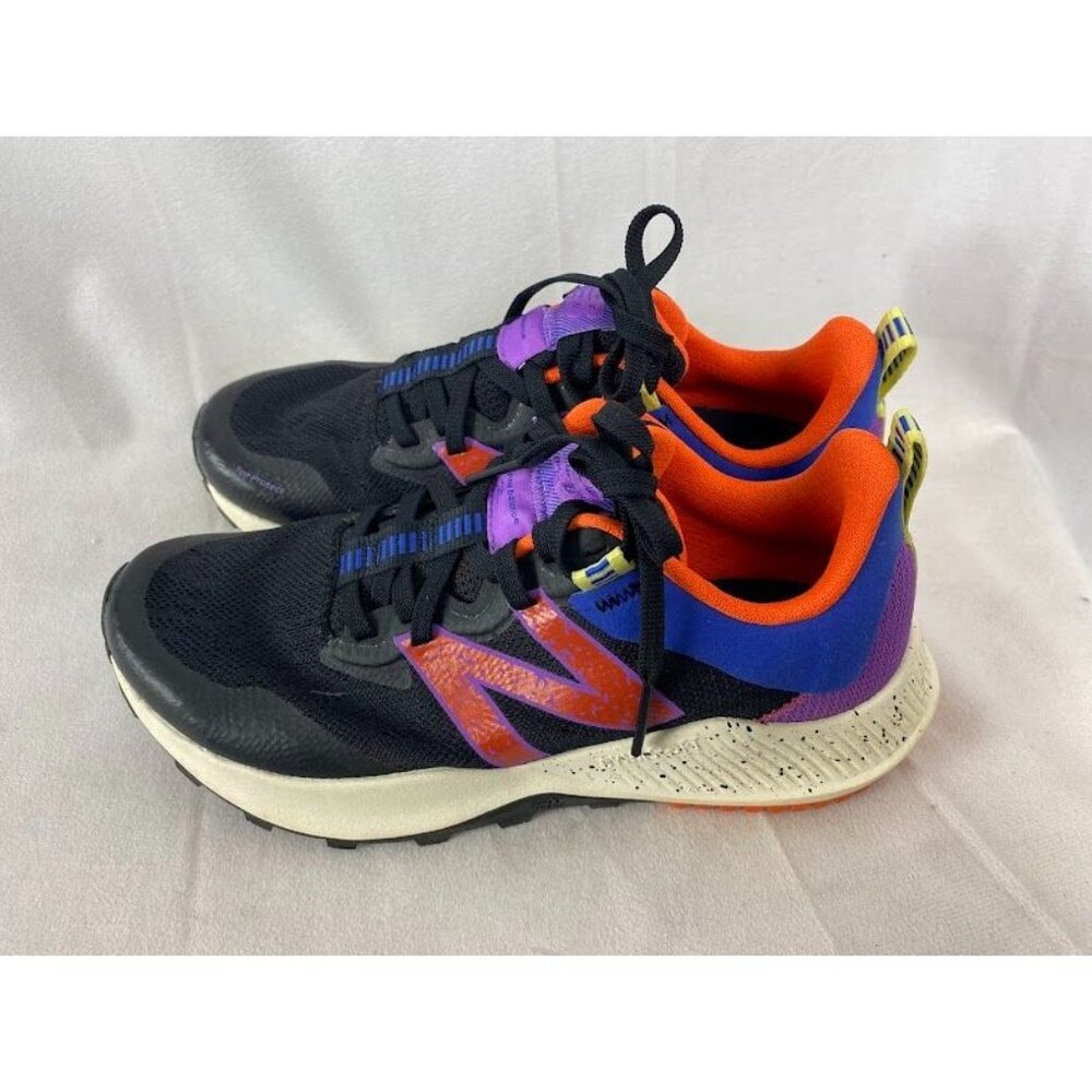 New Balance Women's 8.5 Dynasoft Nitrel V4 Trail Running Shoe Black/‎ Orange.